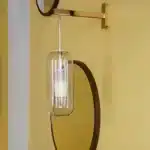 Applique LED moderne dorée en verre pour salon