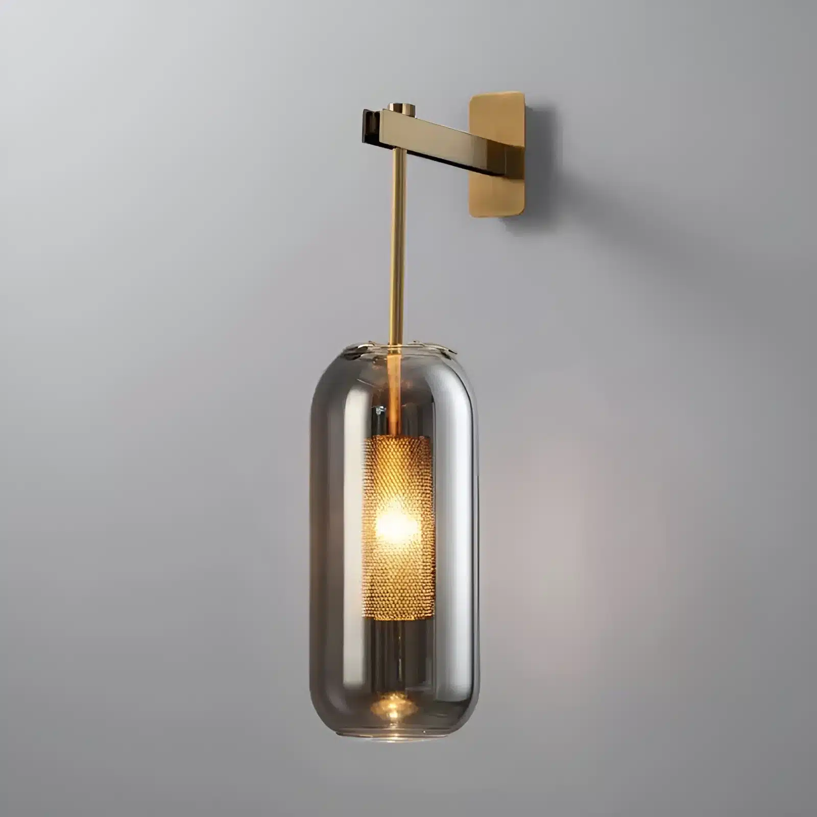 Applique murale LED moderne en verre avec finition gris et doré.