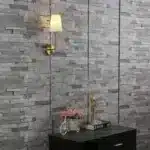 Applique murale dorée avec abat-jour en lin pour décoration intérieure