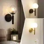 Applique murale avec globe lumineux pour chambre en noir et doré.