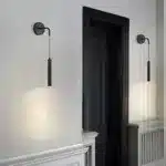 Applique murale LED noire en duo, design élégant pour chambre.