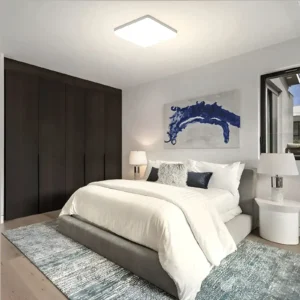 Plafonnier LED carré blanc allumé dans une chambre contemporaine
